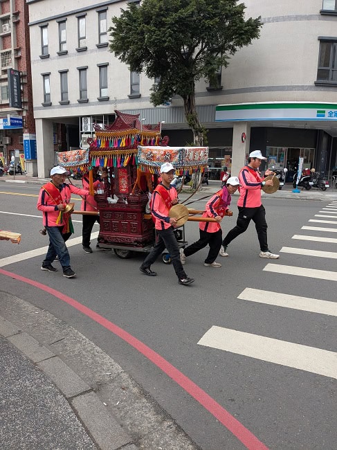 Parading around the city making a lot of noise
