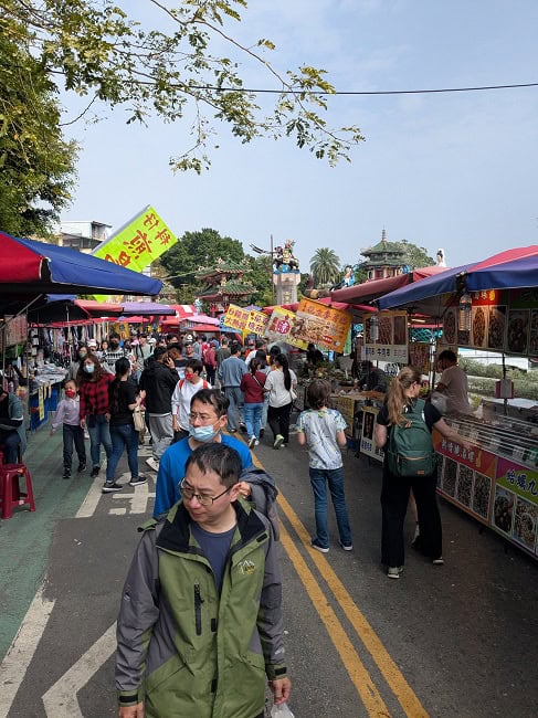 Street vendors and a lot of people
