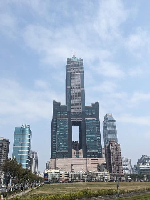 A tall building by Kaohsiung pier 
